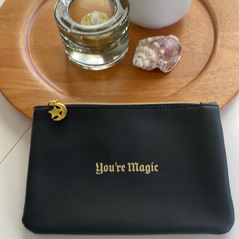 IPSY small bag, 5”X7,” black with gold accents, great condition inside and out